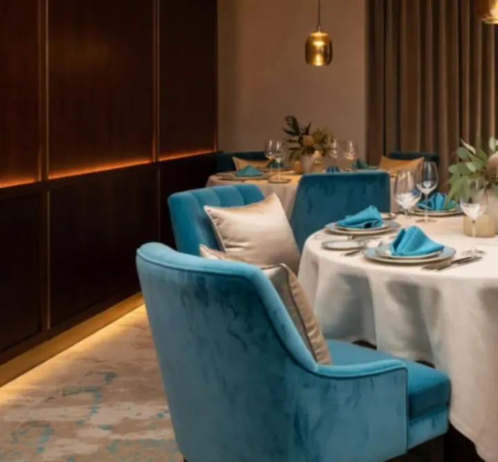 Private dining detail at Aussie Yum featuring elegant table settings and warm lighting